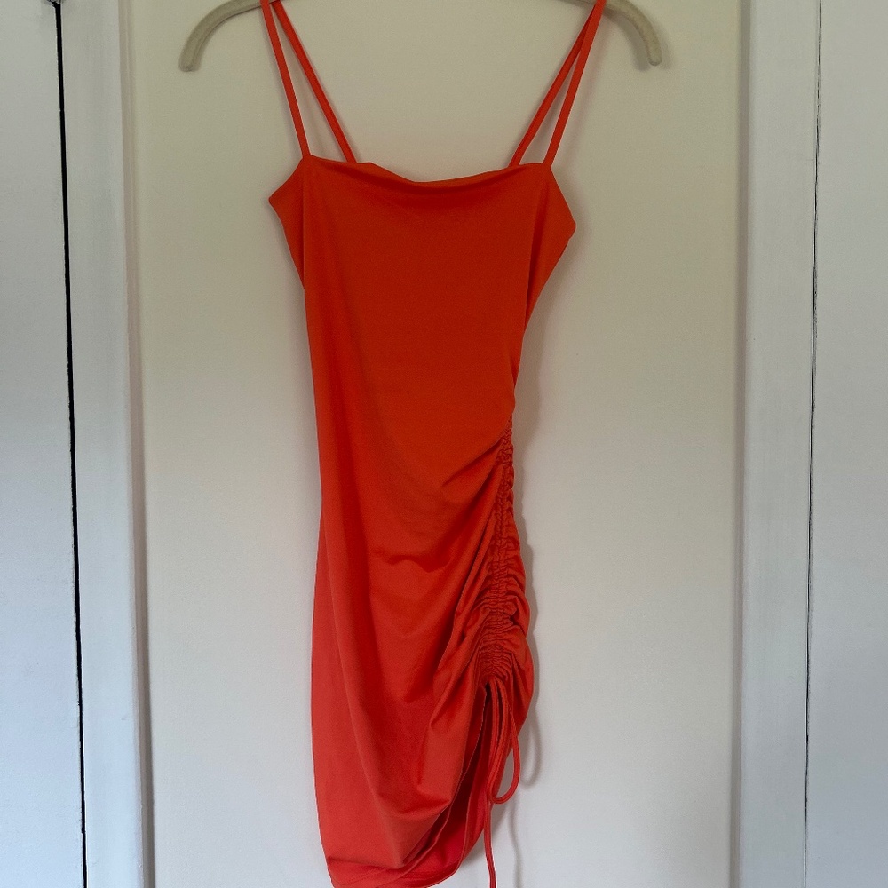 H&M Divided Womens mini body con dress with cinch tie on left side, size xxs.
